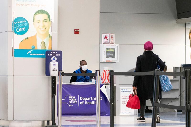 Passengers arrive on a flight from London amid restrictions to prevent the spread of coronavirus at JFK International Airport in New York City. Eduardo Munoz / Reuters