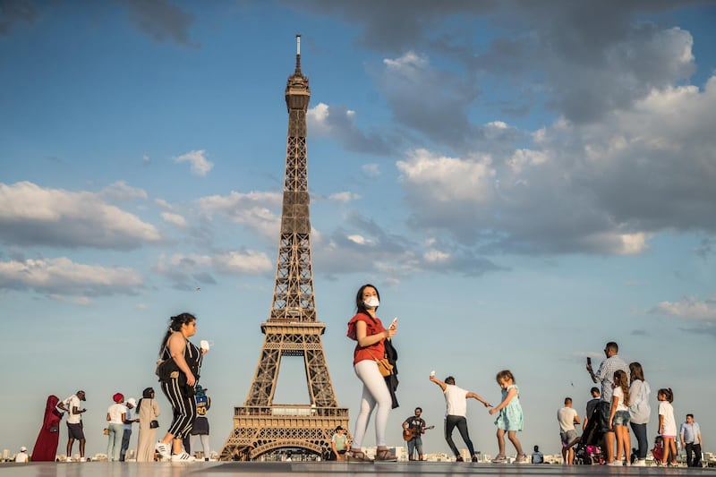 People dance to music at the Trocadero Human Rights Plaza near the Eiffel Tower in Paris, France. EPA