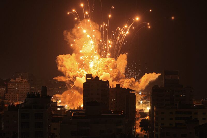 A missile explodes in Gaza city during an Israeli air strike. AFP