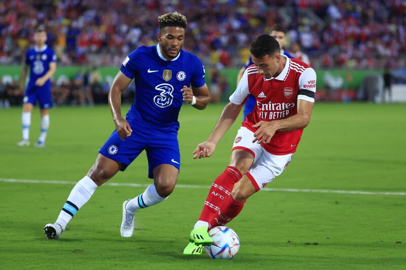 Gabriel Martinelli of Arsenal on the ball while under pressure from Reece James of Chelsea. Getty