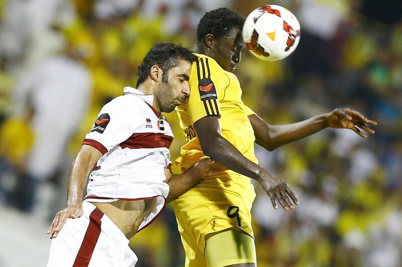 Al Wasl, in yellow, took time to find their feet but rose to the occasion in the second half after changes made by coach Hector Cuper. Hasan Alraesi / Al Ittihad