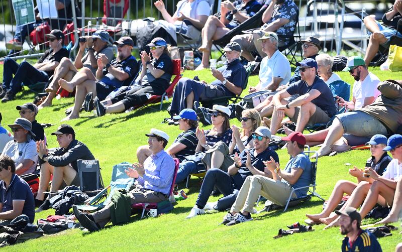 Fans watch the opening day of the first Test in Christchurch. AP
