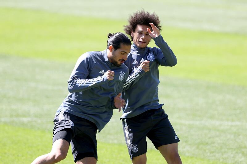 Leroy Sane and Emre Canduring training. Getty