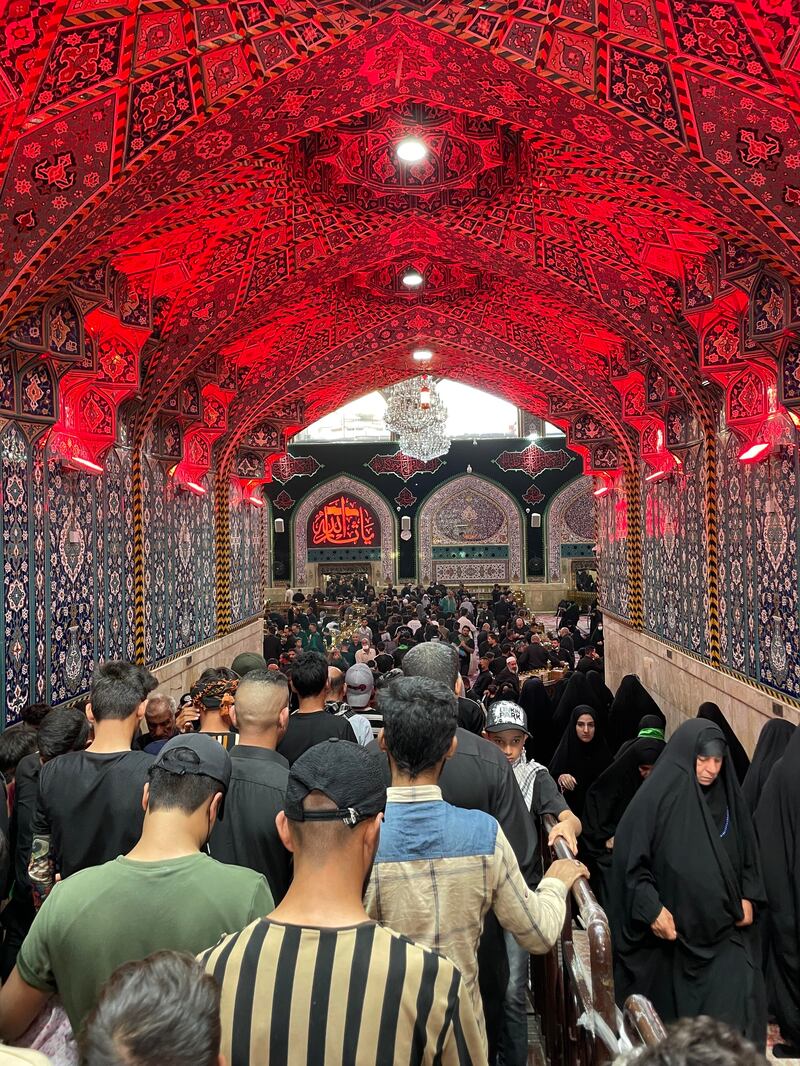 Pilgrims enter the shrine of Imam Hussein. Sinan Mahmoud / The National