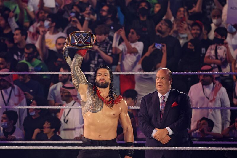 Roman Reigns greets the fans ahead of his match. AFP