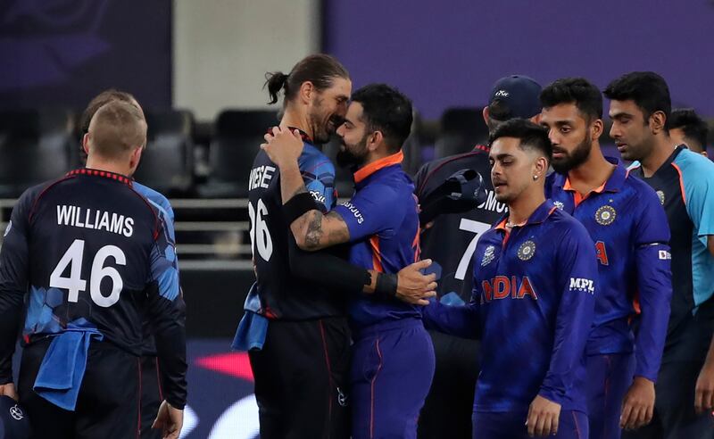India captain Virat Kohli embraces Namibia's David Wiese after India win the T20 World Cup match in Dubai on Monday, November 8, 2021.  AP
