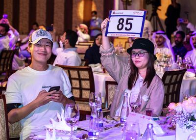 Wednesday’s auction saw real estate agent Hong Yang bid Dh1.7 million for plate number 999, code 2. Victor Besa / The National