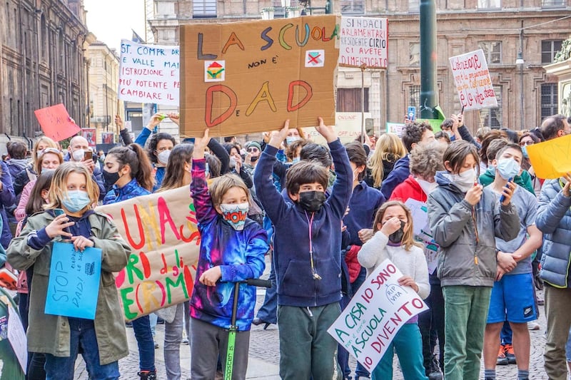 Pupils, parents and teachers demonstrate against distancd learning in Turin, Italy. Around 8 in 10 pupils in Italy are currently doing lessons via video calls. EPA
