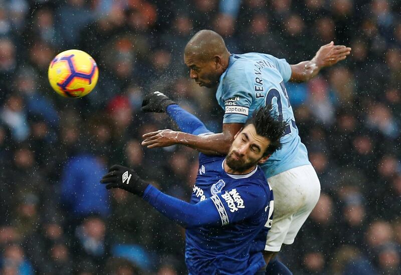 Manchester City's Fernandinho in action with Everton's Andre Gomes. Reuters