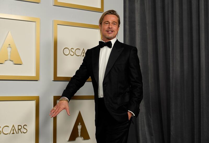 Brad Pitt poses in the press room at the Academy Awards in Los Angeles, California. AP