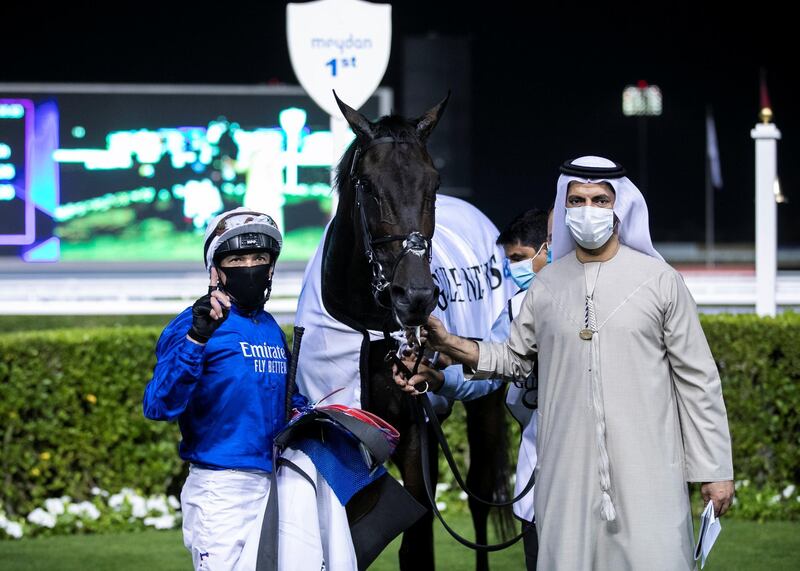 DUBAI, UNITED ARAB EMIRATES. 25 FEBRUARY 2021. 
Jockey Lanfranco Dettori with Saeed bin Suroor celebrate their win of the Nad Al Sheba Trophy race,  2810M Turf, at Meydan Racecourse. 
Photo: Reem Mohammed / The National
Reporter: Amith Passala
Section: SP