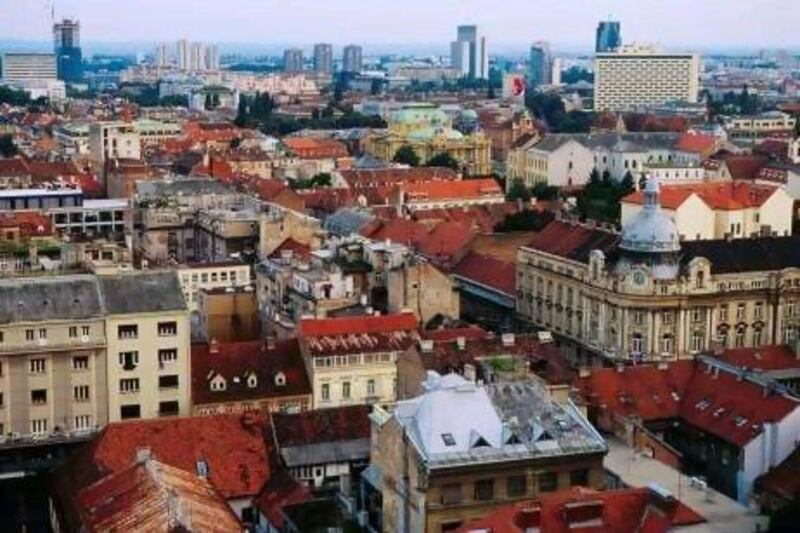 Looking out over the centre of Zagreb from the vantage point of Lotrscak Tower in the medieval area of Gradec. Lonely Planet Images