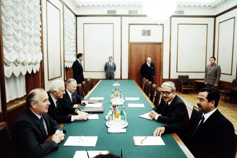 Iraqi President Saddam Hussein (right) and his Vice President Tarek Aziz in Moscow with Mr Gorbachev (left) and his Foreign Minister Edward Shevardnadze during their visit to Soviet Union in 1985. AFP