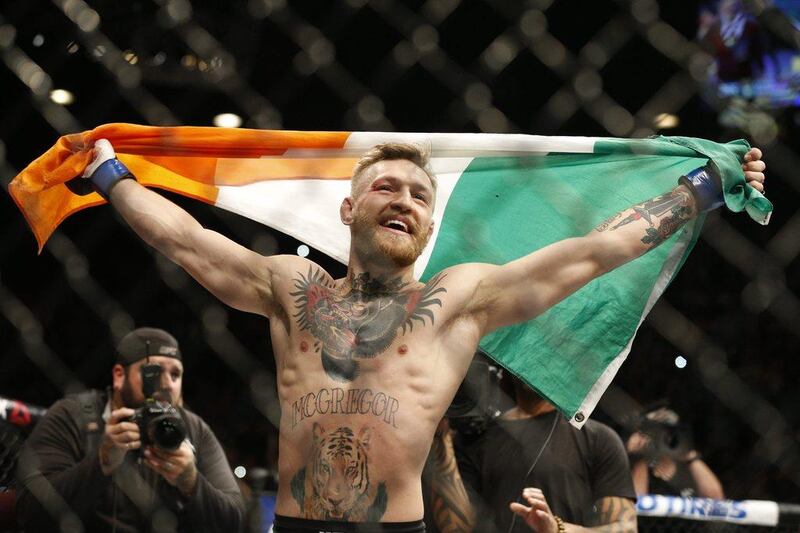 Conor McGregor reacts after defeating Jose Aldo for the featherweight championship at UFC 194 on Sunday in Las Vegas. John Locher / AP / December 12, 2015 
