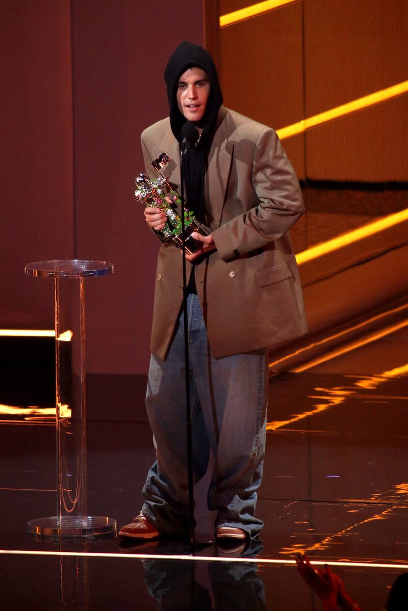 In a hoodie and oversized jacket onstage during the 2021 MTV Video Music Awards in Brooklyn on September 12, 2021. Getty Images