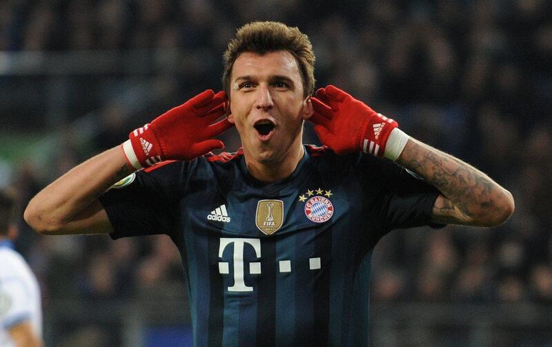 Mario Mandzukic celebrates after scoring for Bayern on Wednesday. Carmen Jaspersen / AFP 