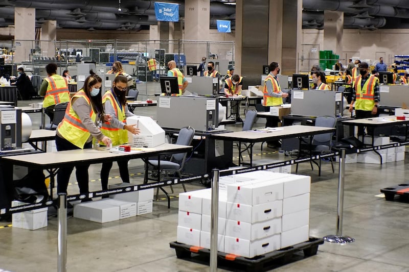 Electoral workers count ballots in Philadelphia, Pennsylvania. Reuters