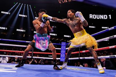 Gervonta Davis, right, hits Mario Barrios during the WBA Super Lightweight world championship boxing match on Sunday, June 27, 2021, in Atlanta. Davis won. (AP Photo/Brynn Anderson)