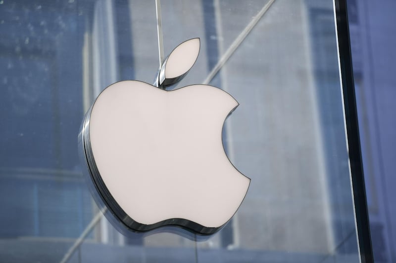 (FILES) This file photo shows a picture taken in center Milan on May 30, 2019 of the logo of American multinational company Apple. Apple is making environmental and social values factors it will weigh when calculating bonuses for top executives, according to a regulatory filing on January 5.
The change taking effect this year is intended to motivate Apple executives "to meet exceptionally high standards of values-driven leadership in addition to delivering strong financial results," the Silicon Valley technology titan said in proxy documents filed with the Securities and Exchange Commission.
 / AFP / Miguel MEDINA
