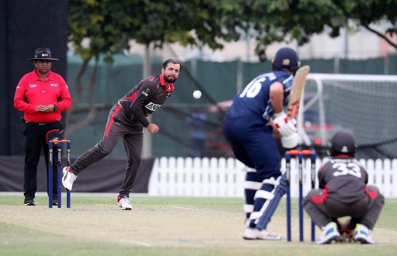 DUBAI, UNITED ARAB EMIRATES , Dec 15– 2019 :- Rohan Mustafa of UAE bowling during the World Cup League 2 cricket match between UAE vs Scotland held at ICC academy in Dubai. Rohan Mustafa took 3 wickets in this match. ( Pawan Singh / The National )  For Sports. Story by Paul