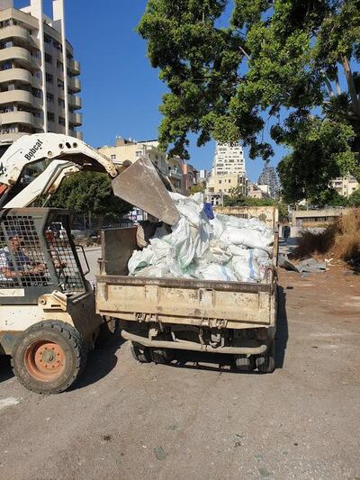 Pick-up trucks have been going door to door to collect the shattered glass. Courtesy Ziad Abi Chaker