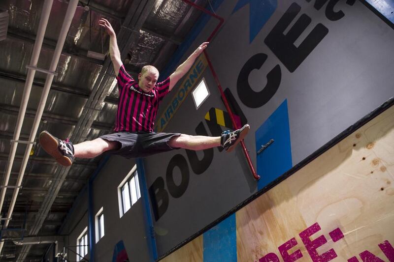 Danny Leicester shows off his trampoline and gymnastics skills at the newly opened Bounce trampoline facility in Dubai. Antonie Robertson / The National