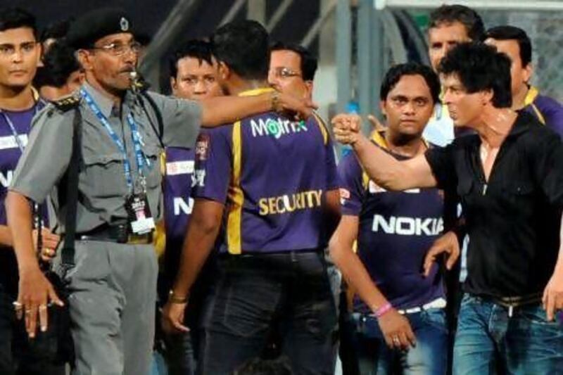 The Bollywood actor and Kolkata Knight Riders co-owner Shah Rukh Khan, right. Indranil Mukherjee / AFP