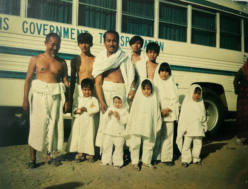 Wejdan Bugis, the youngest in the middle, is surrounded by her family and cousins in hajj 1975, as all the Mutwaif family would participate in hajj.