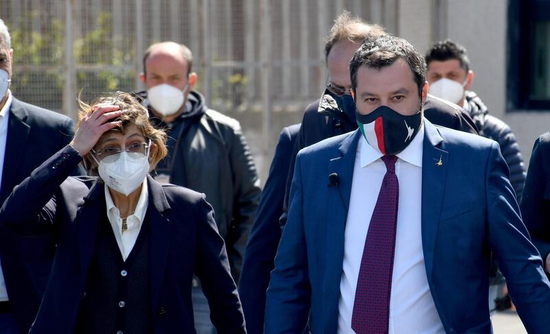 epa09126711 Italy's League Party leader Matteo Salvini (R), with his lawyer Giulia Bongiorno (L), leaves the bunker hall of the prison Bicocca at the end of the preliminary hearing for the request of referral to trial that sees the former Italian Interior Minister accused for kidnapping of person for the delays in the landing of 131 migrants from the ship Gregoretti, happened in Augusta on July 2019, Catania, Italy, 10 April 2021.  EPA/ORIETTA SCARDINO