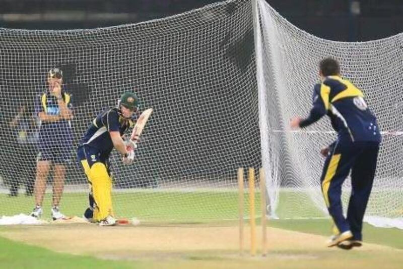 David Warner, the Australia opening batsman, has a go at the nets in Abu Dhabi. Ravindranath K / The National