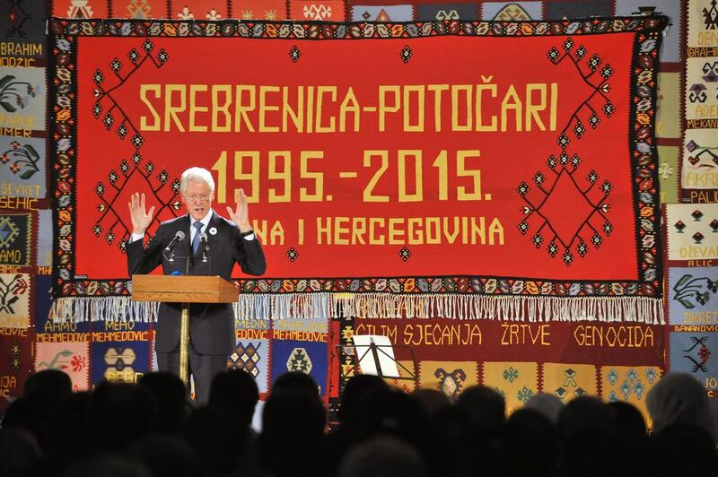 Former US president Bill Clinton delivers a speech at Potocari in Bosnia and Herzegovina, during a ceremony marking the 20th anniversary of the 1995 Srebrenica massacre. The strikes by the US in Syria have been compared to Mr Clinton’s intervention. Elvis Barukcic / AFP Photo