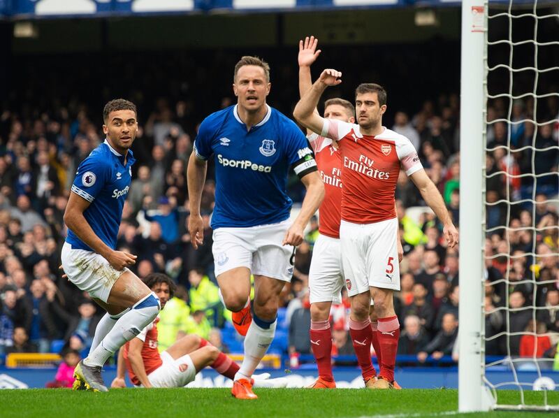 epa07490163 Everton's Phil Jagielka (C) celebrates scoring the first goal during the English Premier League soccer match between Everton and Arsenal held at Goodison Park in Liverpool, Britain, 07 April 2019.  EPA/PETER POWELL EDITORIAL USE ONLY. No use with unauthorized audio, video, data, fixture lists, club/league logos or 'live' services. Online in-match use limited to 120 images, no video emulation. No use in betting, games or single club/league/player publications