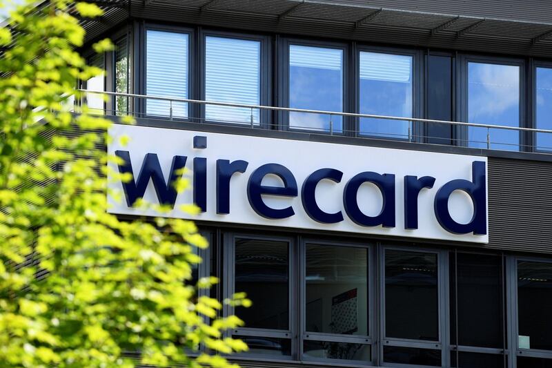 FILE PHOTO: The logo of Wirecard AG, an independent provider of outsourcing and white label solutions for electronic payment transactions, is pictured at its headquarters in Aschheim, near Munich, Germany, July 1, 2020. REUTERS/Andreas Gebert/File Photo