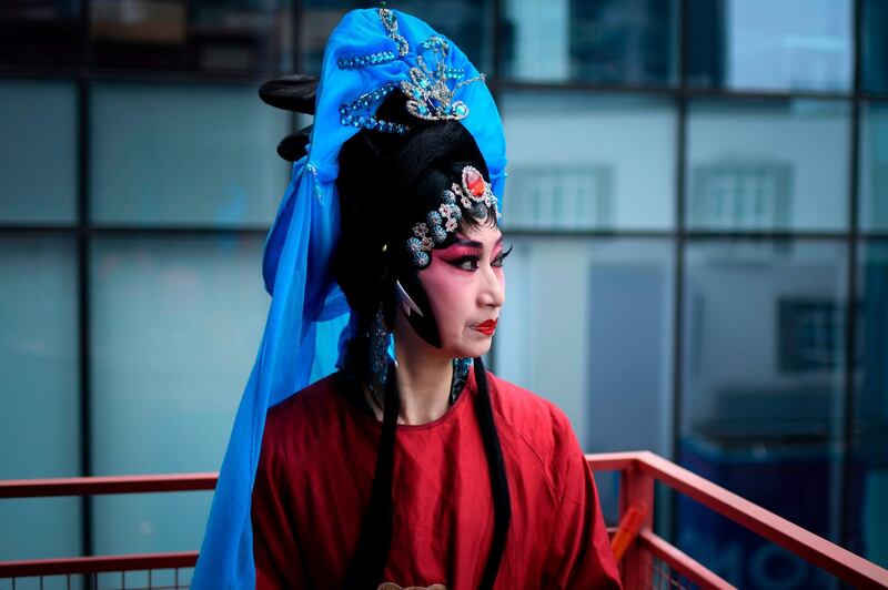An artist of Baijiaban Sichuan Opera Troupe preparing to perform at a mini theatre in Chengdu, China. AFP