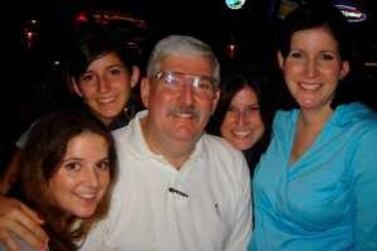 Robert Levinson with his daughters.