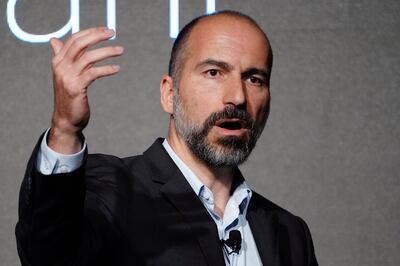 FILE PHOTO: Uber Chief Executive Dara Khosrowshahi pictured on stage during an event in New York City, New York, U.S., September 5, 2018. REUTERS/Carlo Allegri/File Photo