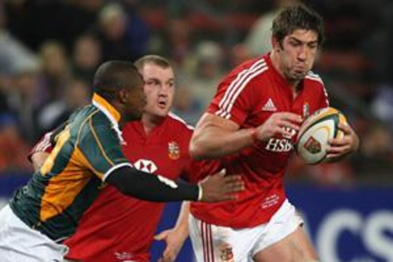Nathan Hines, with ball, could have worn the famous British & Irish Lions red shirt for the last time on their tour of South Africa after he was suspended for one week following a dangerous tackle.