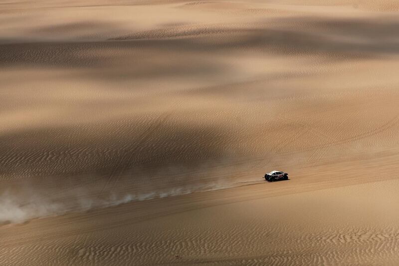 Srt Racing no. 356 BUGGY LCR30 car driven by Michael Pisano and Valentin Sarreaud races on the sand dunes. Getty Images