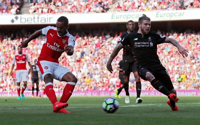 Arsenal’s Theo Walcott scores their first goal against Liverpool at the Emirates Stadium in London, Britain, 14 August 2016. Eddie Keogh / Reuters