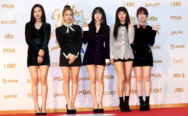 In this Jan. 10, 2018, photo, South Korean popular girl band Red Velvet poses for photographers during the 32nd Golden Disc Awards in Goyang, South Korea. South Korea said on Tuesday, March 20, 2018, it will send a 160-member artistic delegation to North Korea, including about 10 popular K-Pop singers. Red Velvet is also among the South Korean groups. (Lim Tae-hoon/Newsis via AP)