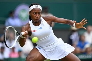 (FILES) In this file photo taken on July 5, 2021 US player Coco Gauff returns against Germany's Angelique Kerber during their women's singles fourth round match on the seventh day of the 2021 Wimbledon Championships at The All England Tennis Club in Wimbledon, southwest London.  - The Olympic Games' tennis tournament, already missing the likes of Roger Federer, Rafael Nadal and Serena Williams, lost another draw card when American teenager Coco Gauff pulled out after testing positive for Covid-19.  (Photo by Glyn KIRK  /  AFP)  /  RESTRICTED TO EDITORIAL USE
