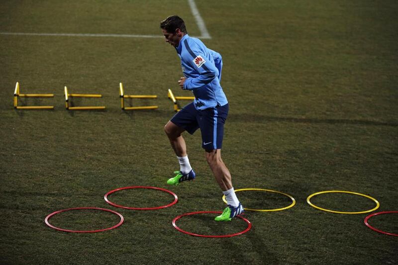 Fernando Torres trains with Atletico Madrid on Tuesday. Susana Vera / Reuters