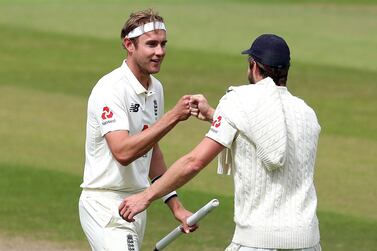 England's Chris Woakes (right) and Stuart Broad at the end of day five of the Third Test at Emirates Old Trafford, Manchester. PA Photo. Issue date: Tuesday July 28, 2020. See PA story CRICKET England. Photo credit should read: Martin Rickett/NMC Pool/PA Wire. RESTRICTIONS: Editorial use only. No commercial use without prior written consent of the ECB. Still image use only. No moving images to emulate broadcast. No removing or obscuring of sponsor logos.