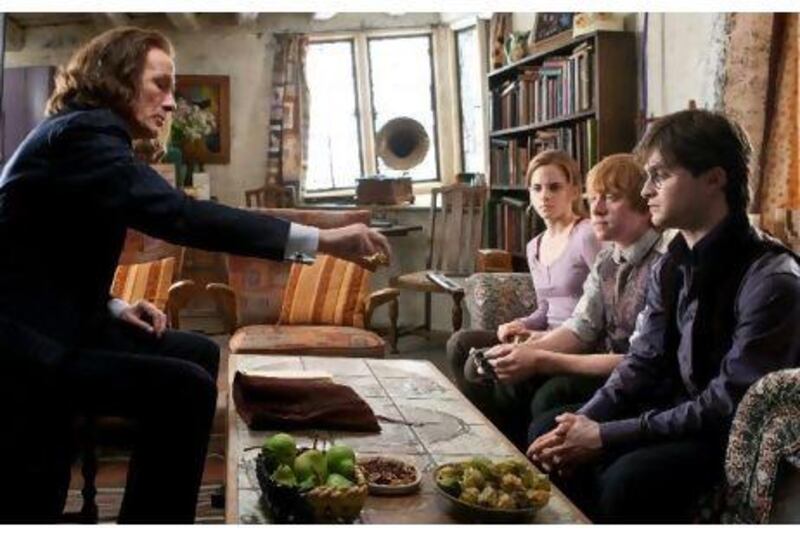 From left, Bill Nighy, Emma Watson, Rupert Grint and Daniel Radcliffe in a scene from Harry Porter and the Deathly Hallows Part 1.