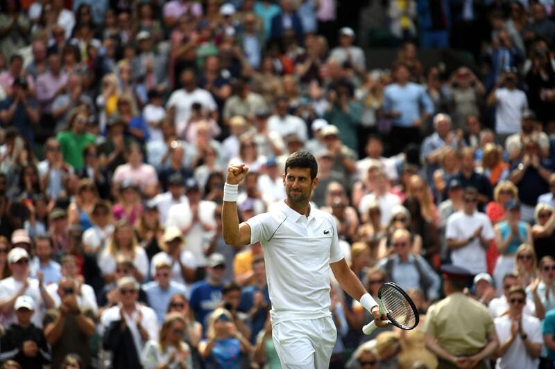 Djokovic celebrates after winning. EPA