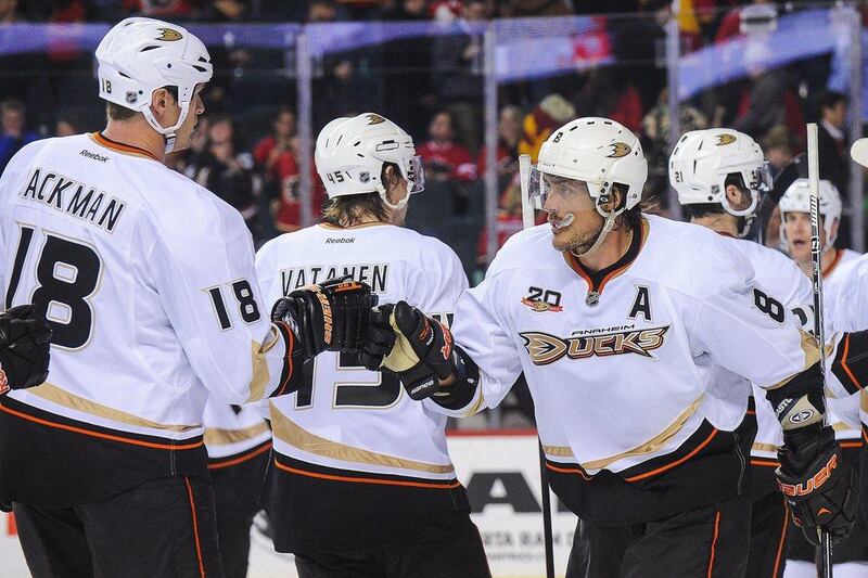 Tim Jackman, left, and Teemu Selanne of the Anaheim Ducks celebrate after defeating the Calgary Flames during an NHL game at Scotiabank Saddledome on March 26, 2014 in Calgary, Alberta, Canada. The Ducks defeated the Flames 3-2. Derek Leung/Getty Images
