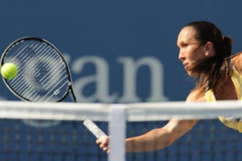 Jelena Jankovic returns to Elena Dementieva in their semi-final match at Flushing Meadows.