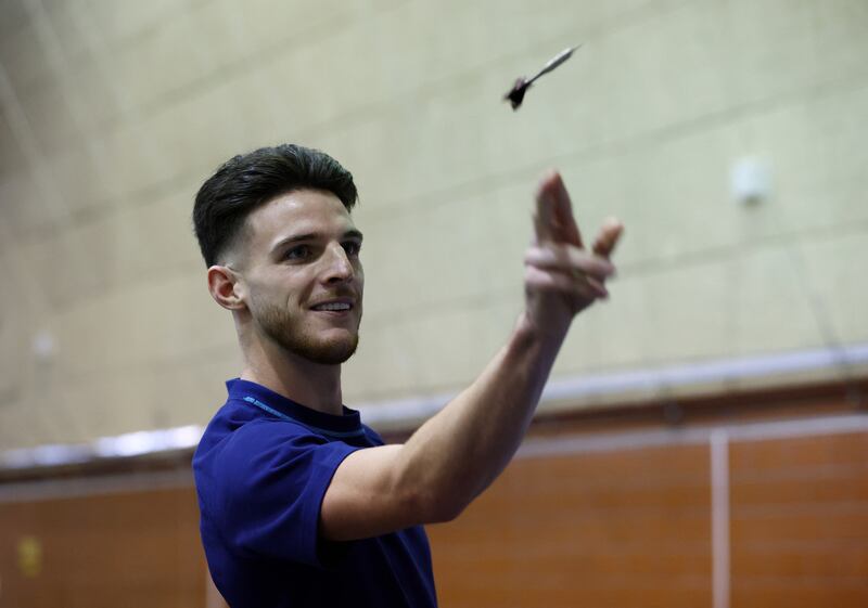 England's Declan Rice plays darts at Al Wakrah Sports Club. Reuters