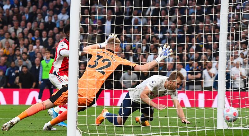 Harry Kane - 9: Side-footed confident penalty into bottom corner to put Spurs in front then headed second from a metre out for his 12th and 13th goals against Arsenal. Denied hat-trick when swerving shot from distance saved by Ramsdale. EPA