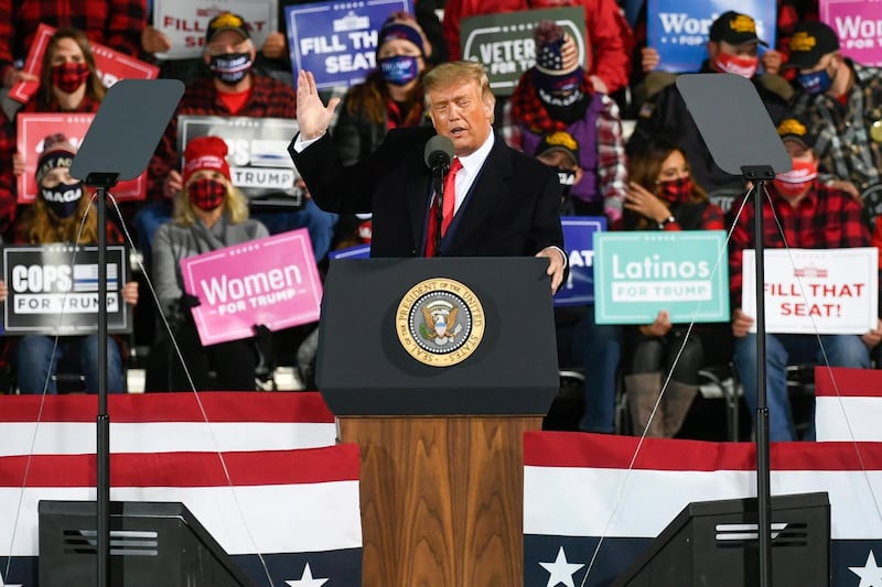 US President Donald Trump speaks during a 'Make America Great Again' election campaign rally at Duluth International Airport in Duluth, Minnesota. EPA